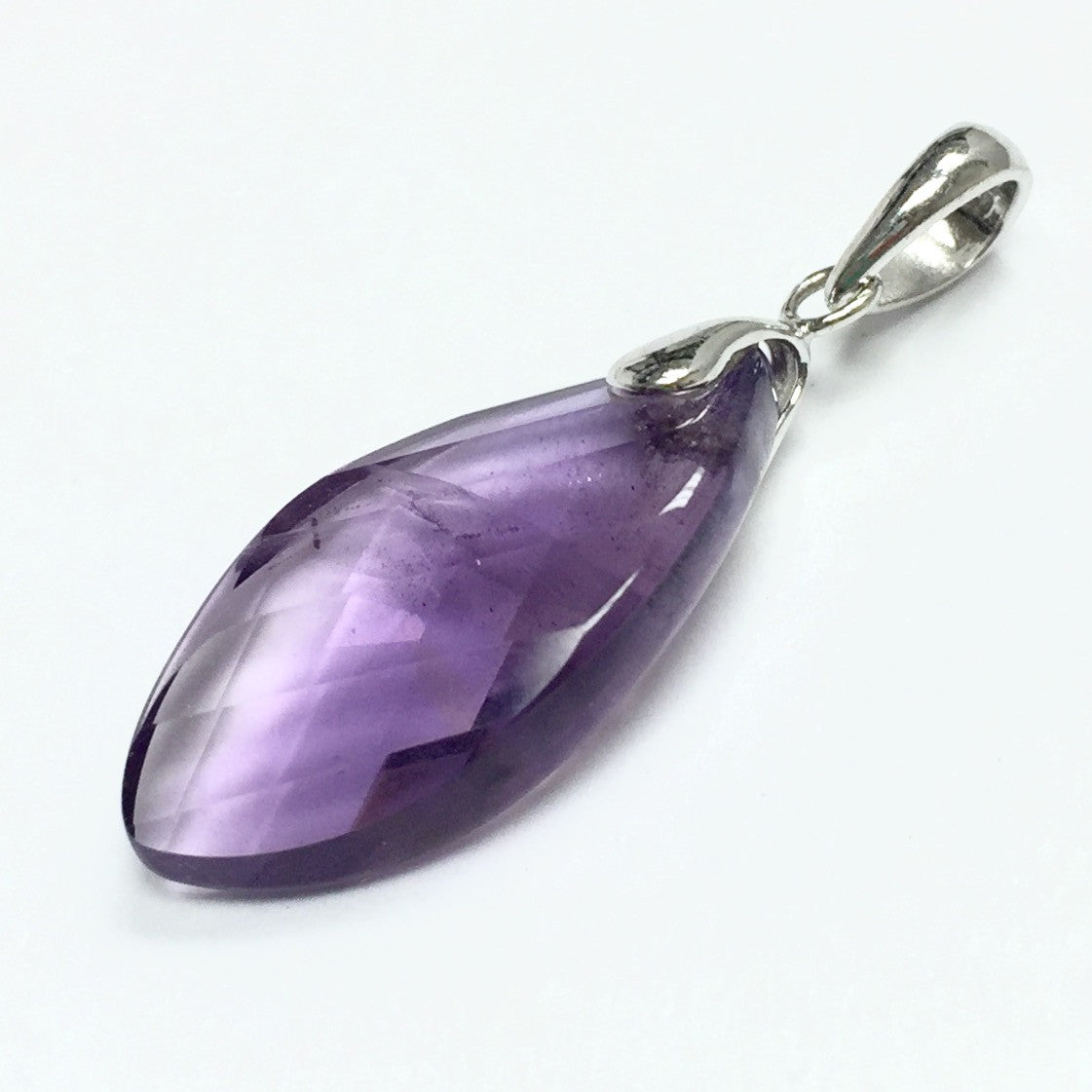 Amethyst Faceted Navette Pendant with a Twist 10 x 20 x 5mm
