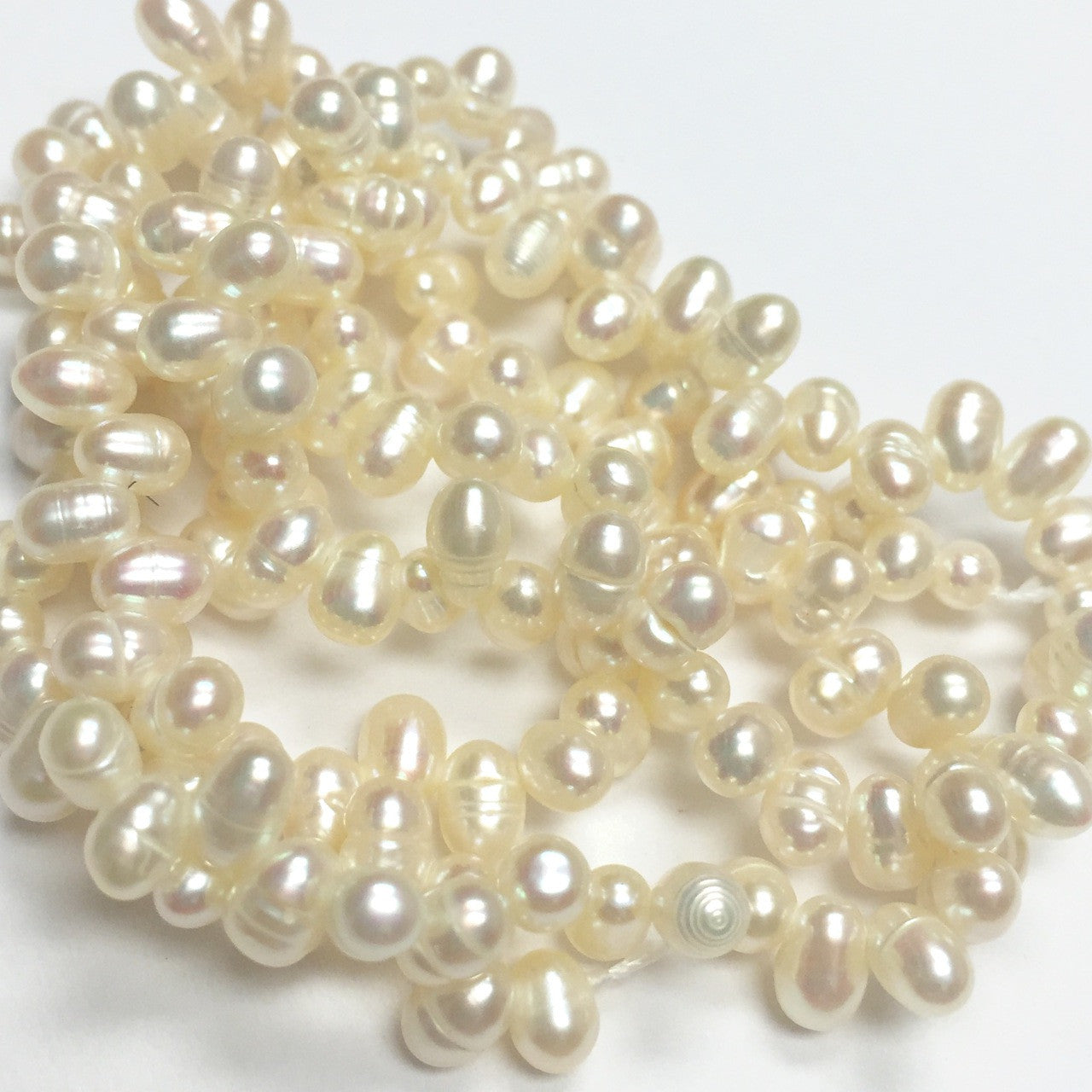 Sweet Ivory Top Drilled Dancing Freshwater Pearls 2.5-3mm