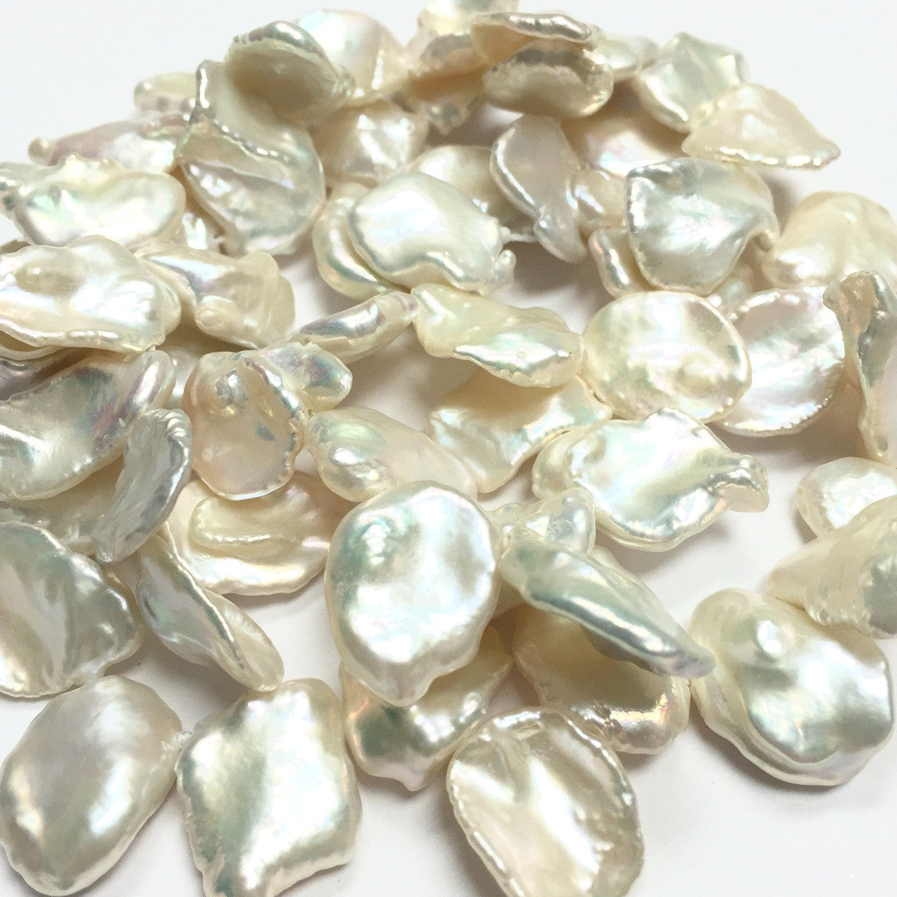 Top Drilled "Dancing" Keishi Ivory Freshwater Pearls