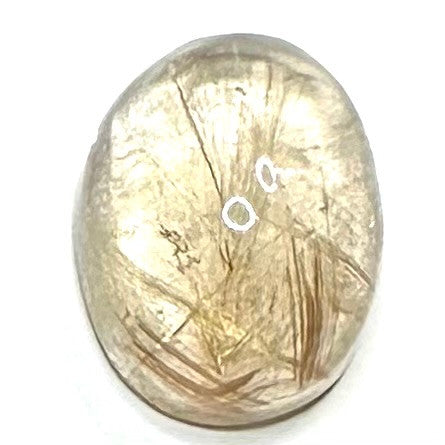 One of a kind Rutile Quartz oval high dome cabochon. This cut and polished Rutile Quartz cabochon measures 22 x 17mm in size with a height of 12mm. The needle like rutile inclusions in these cabs are formations of titanium dioxide along with iron oxide. These Rutile "needles" each transmit energy independently. Rutile protects against the ill thoughts of others and helps stabilize moods while relieving anxiety, fears and phobias. Quartz Crystal is known to be a very powerful stone and is often referred to a