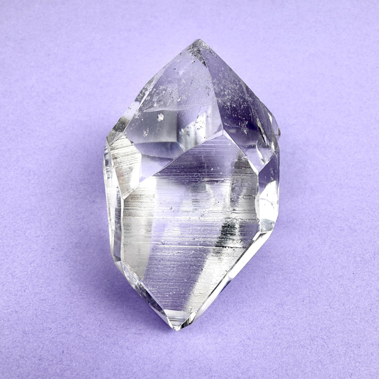 clear faceted crystal with sharp angles