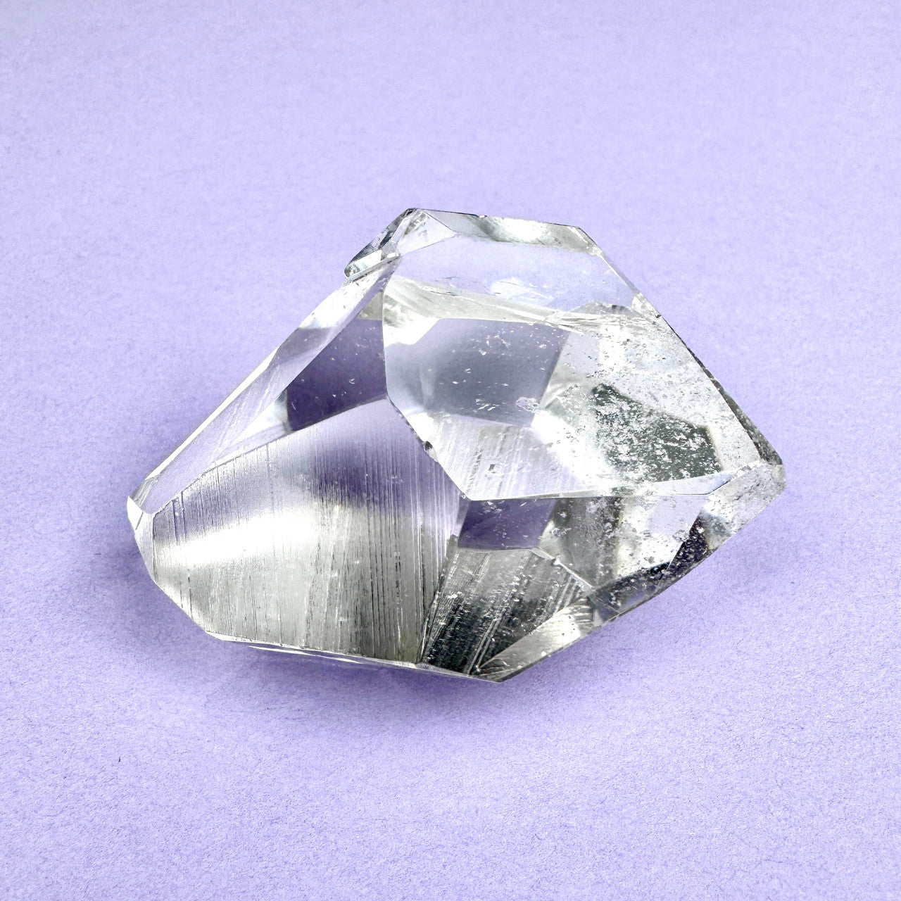 clear faceted crystal with sharp angles