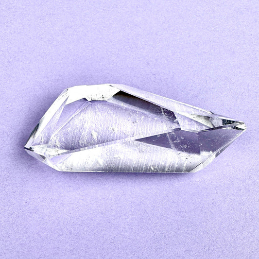 clear faceted crystal with sharp angles