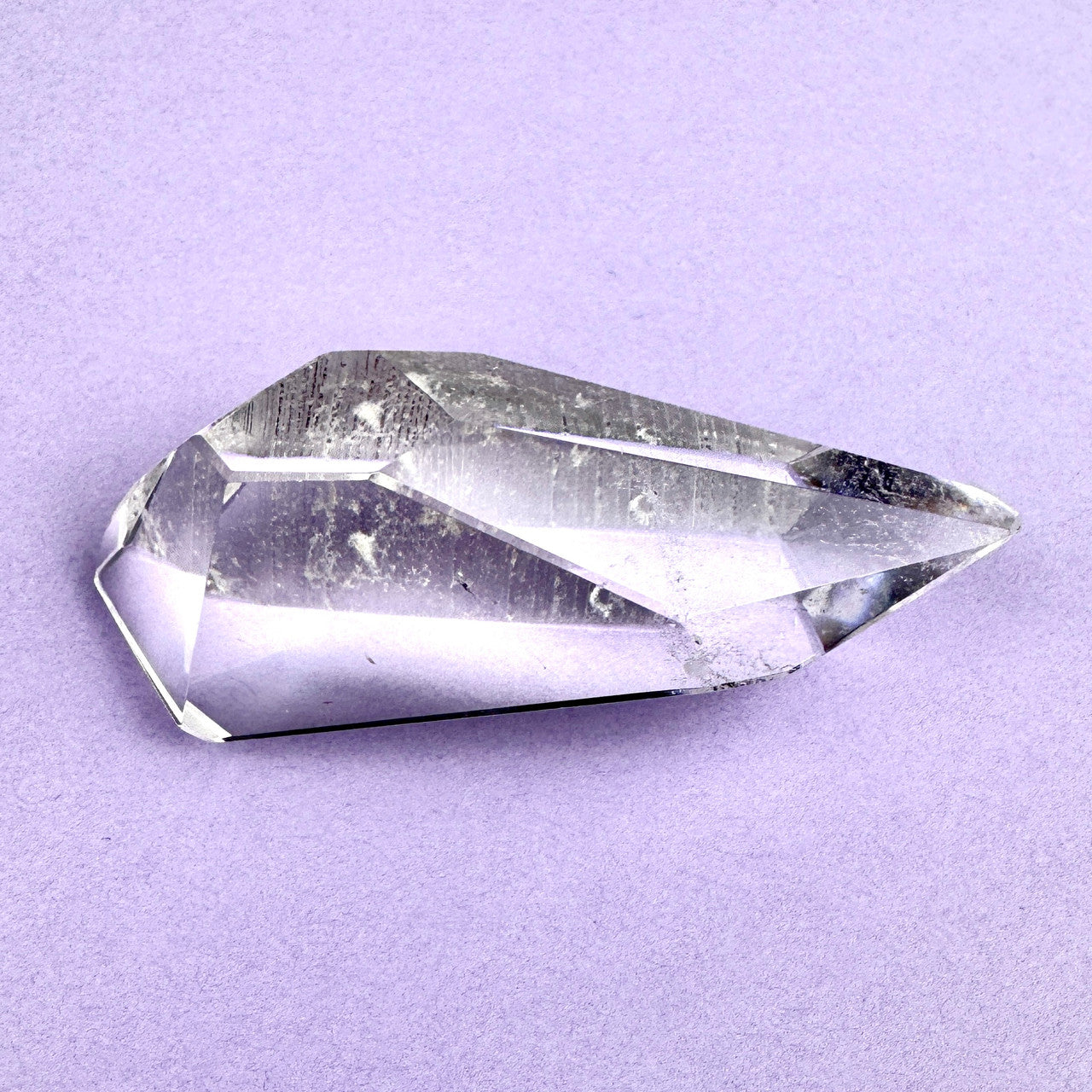 clear faceted crystal with sharp angles
