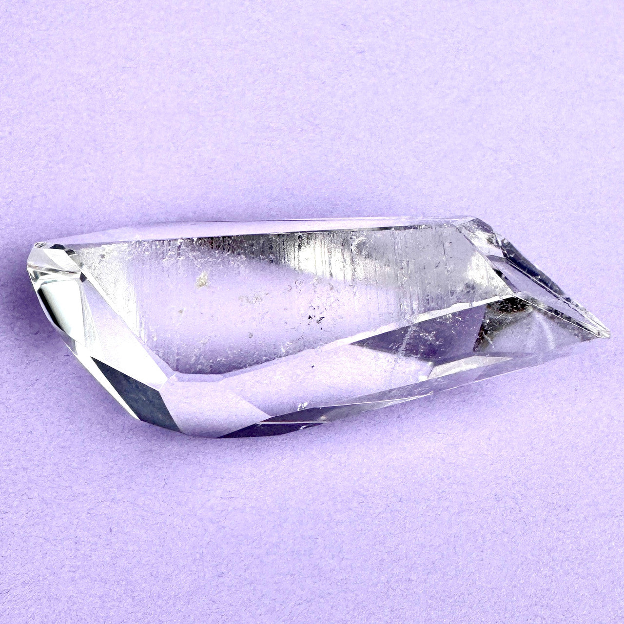 clear faceted crystal with sharp angles