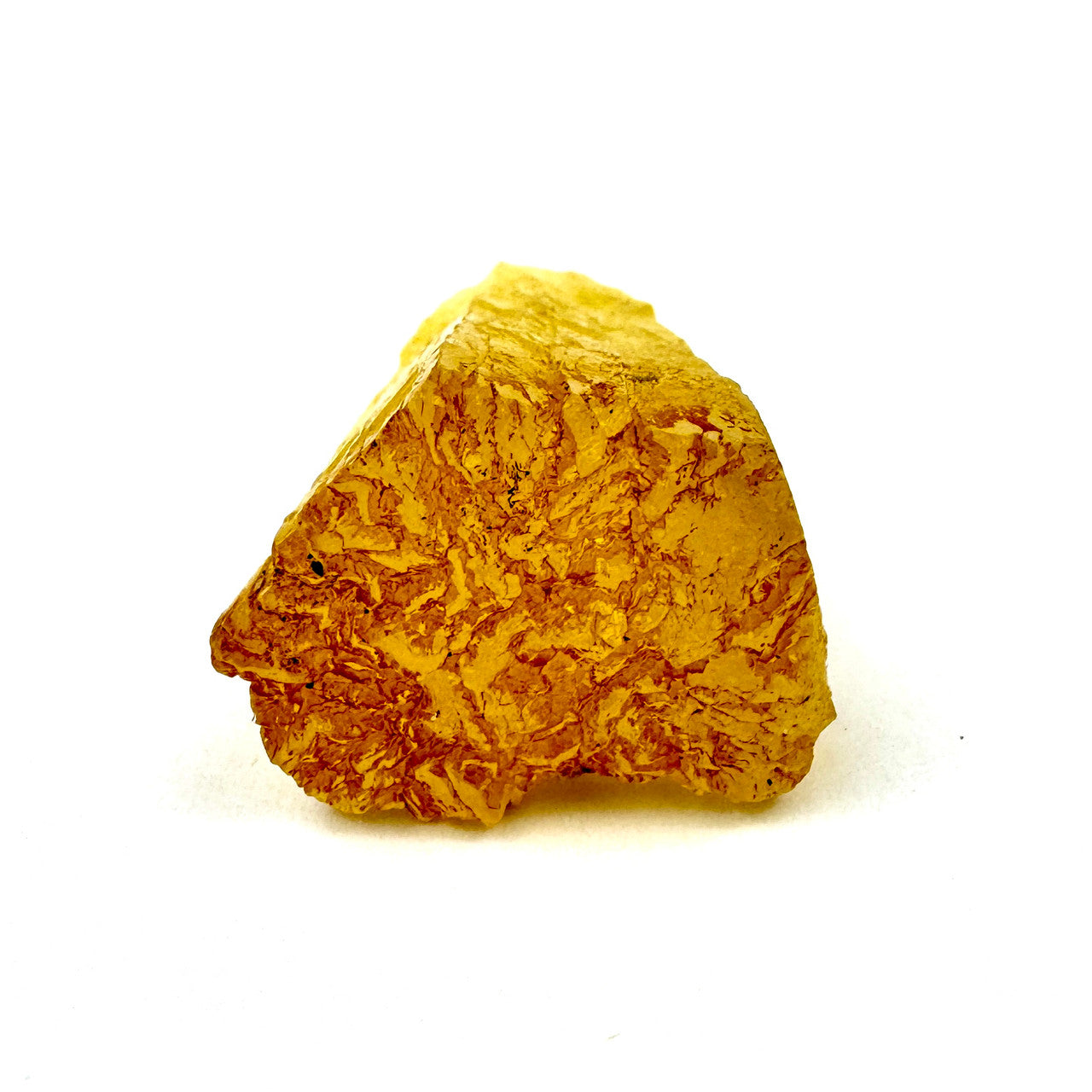 close-up of a rough amber stone