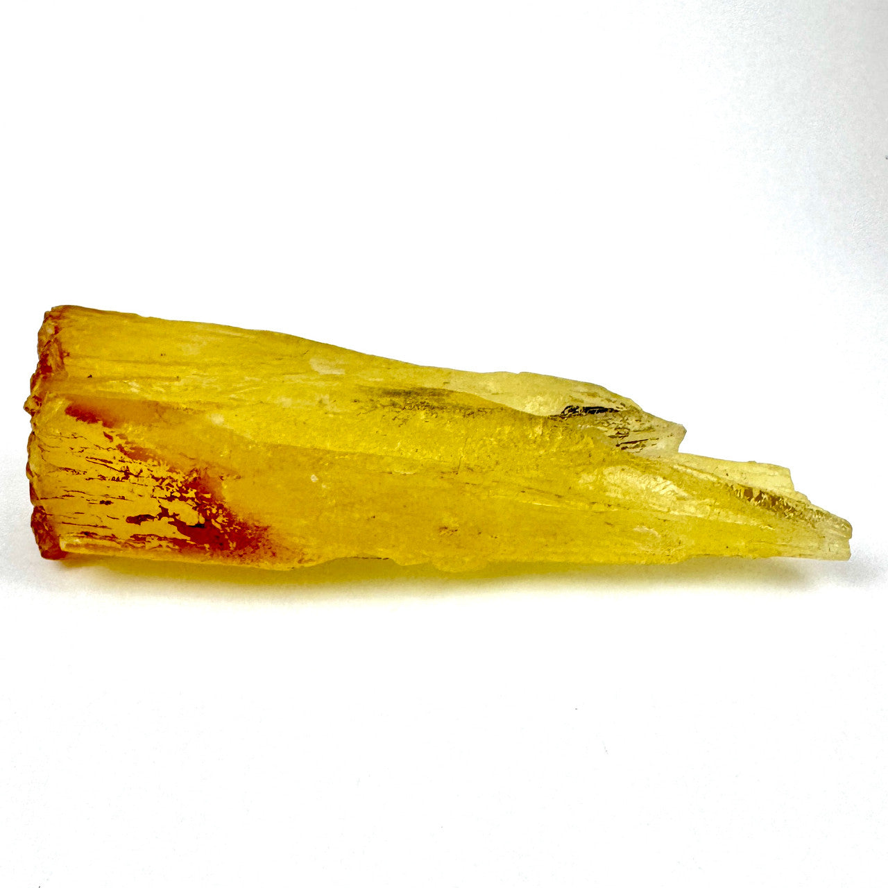 yellow translucent crystal with sharp edges