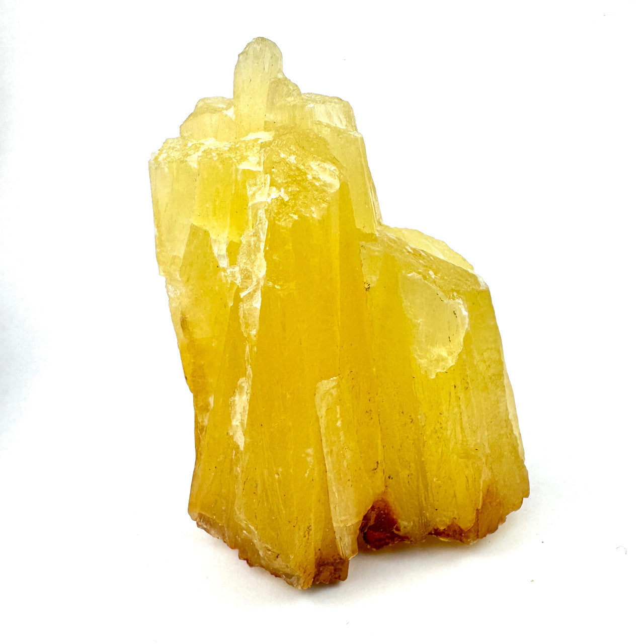 large yellow crystalline formation with sharp, jagged edges