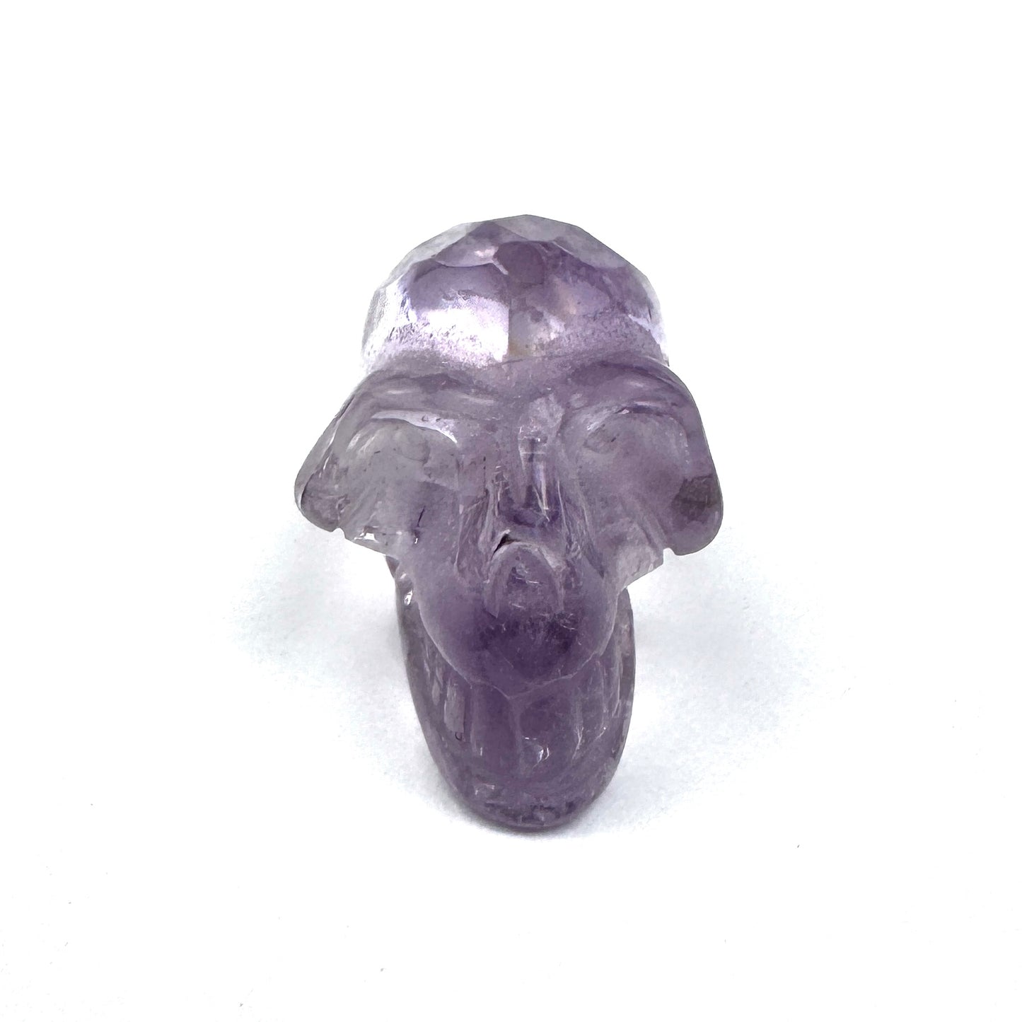 carved amethyst skull figurine