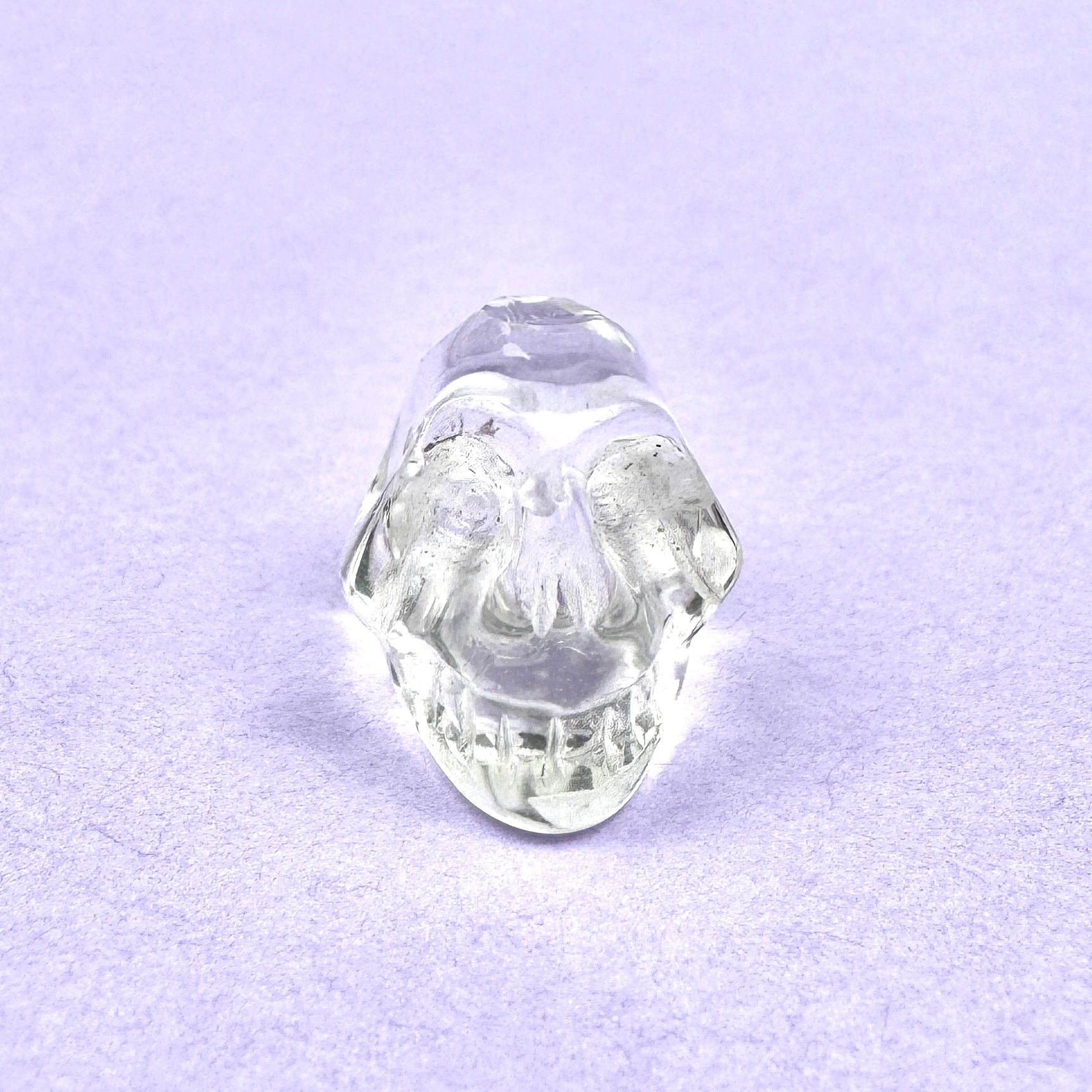 clear quartz caved & faceted skull bead