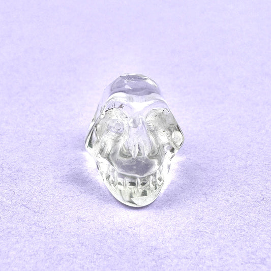 clear quartz caved & faceted skull bead