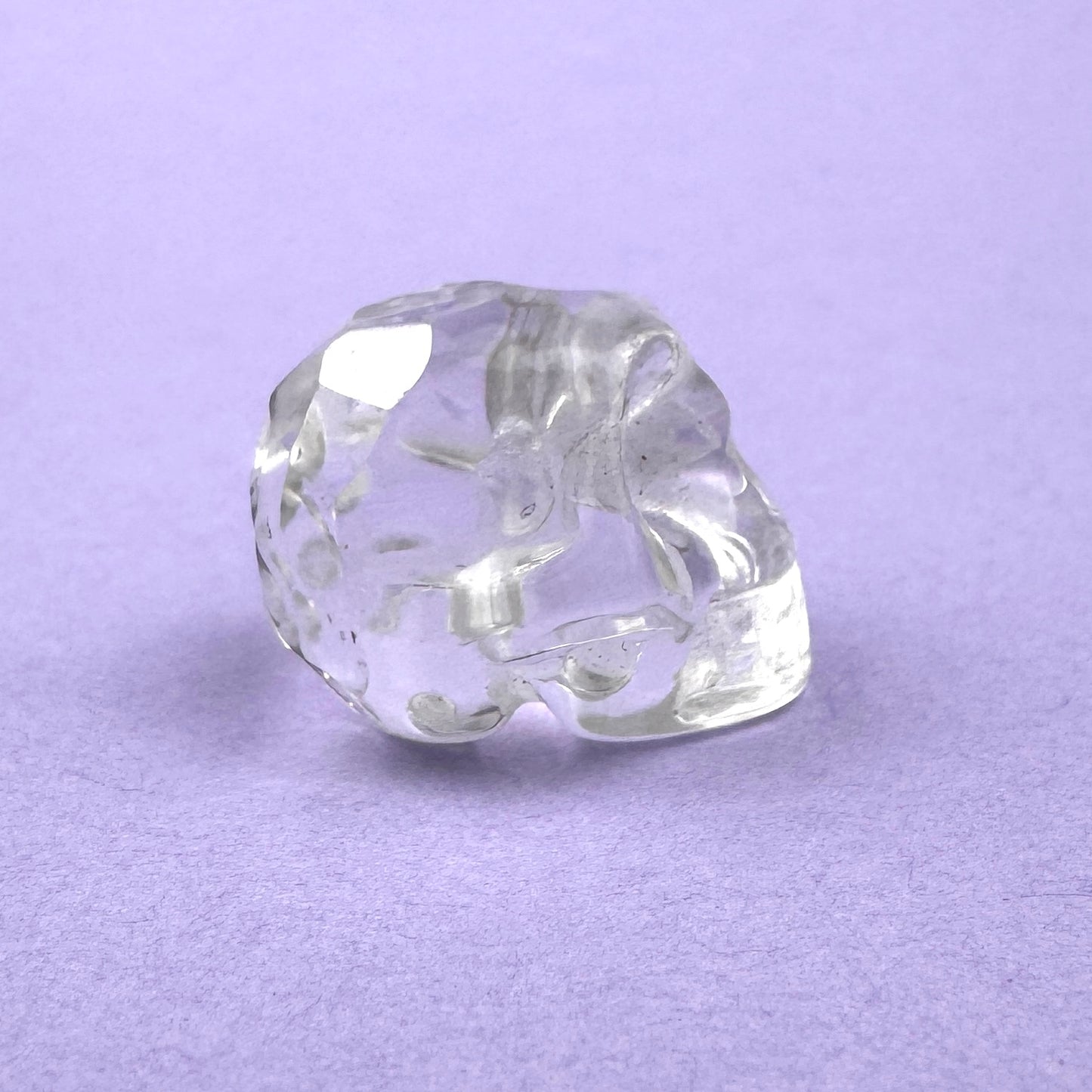 clear quartz caved & faceted skull bead