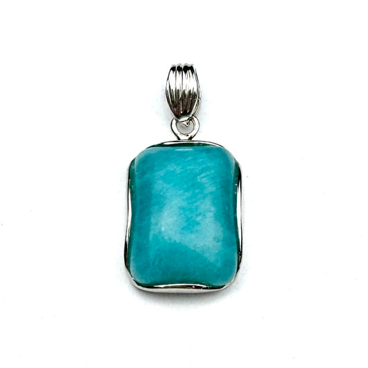 turquoise-colored gemstone pendant with a silver setting