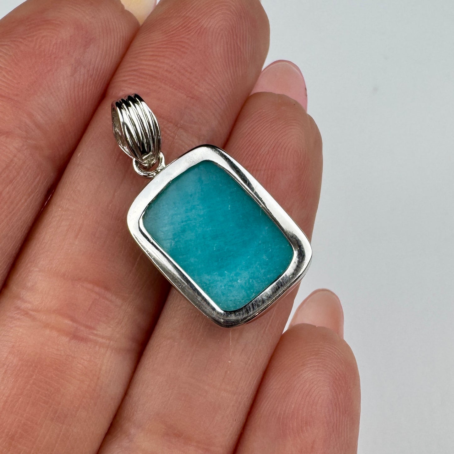 close-up of turquoise gemstone pendant