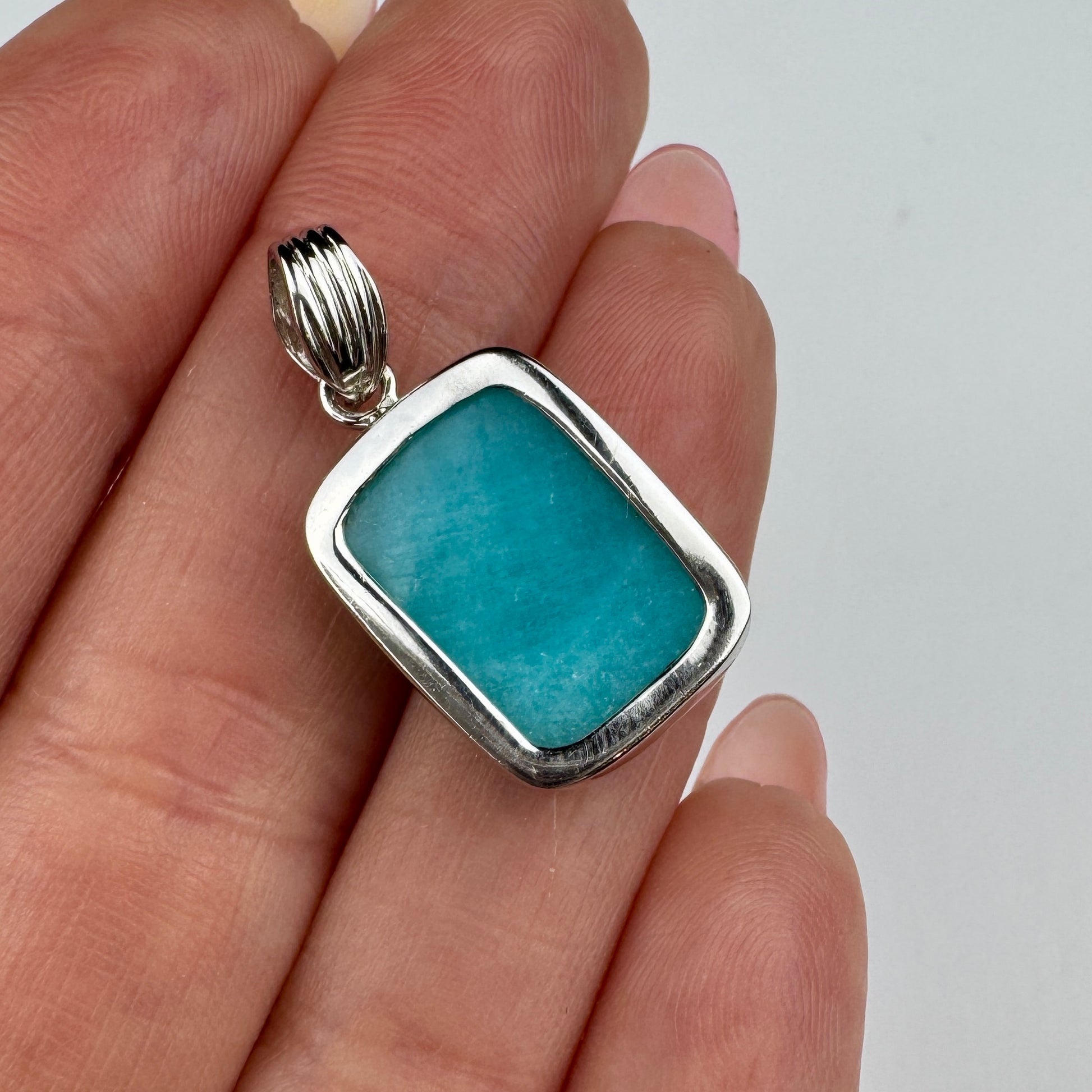 close-up of turquoise gemstone pendant