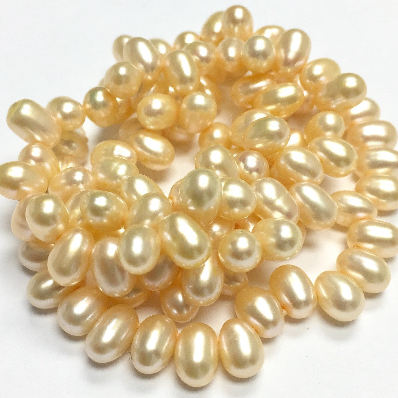 Freshwater Cream Top Drilled Dancing Rice Pearl Beads-4 x 6mm