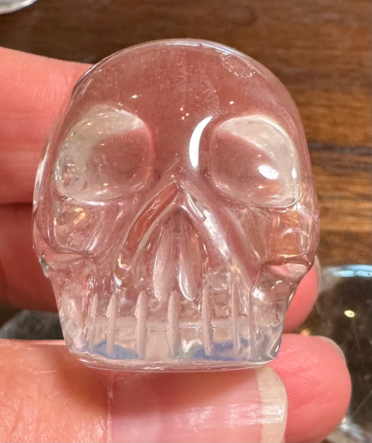 Master Carved Lemurian Quartz Crystal Skull with Brilliant Rainbow Flash – Vanderlei Barreto – Brazil – Item #NC7892