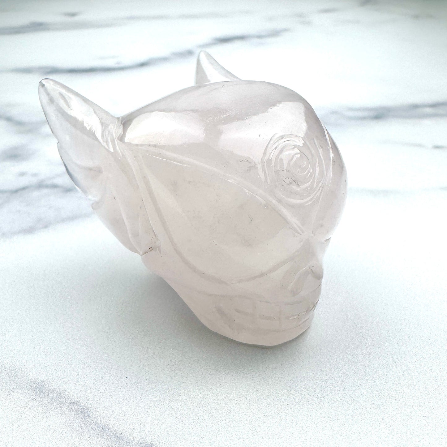 Master Carved Rose Quartz Cosmic Angel Skull #777 1 3/4 x 2" - NC7682