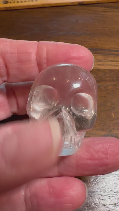 Master Carved Lemurian Quartz Crystal Skull with Brilliant Rainbow Flash – Vanderlei Barreto – Brazil – Item #NC7892