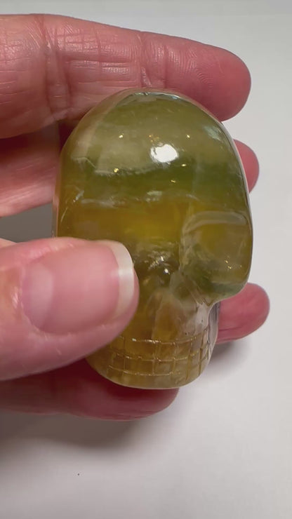 Master Carved Banded Fluorite Crystal Skull by Leandro de Souza 1¼ in x 2⅛ in x 1⅝ in #NC7941